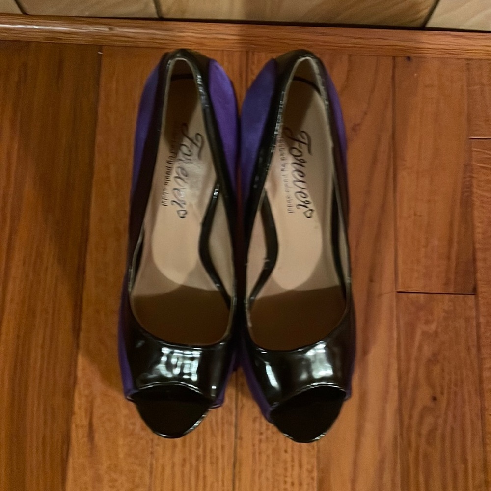 Nice Dressy high heels have not been worn just tried on purple and black size 8